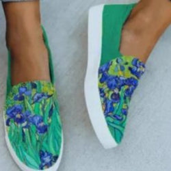 Green round toe canvas shoes with faux leather floral design and low heel