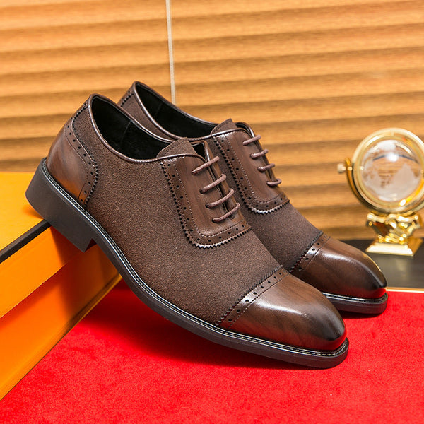 Men's thick-soled raised round toe brown leather lace-up business shoes on orange box and red surface