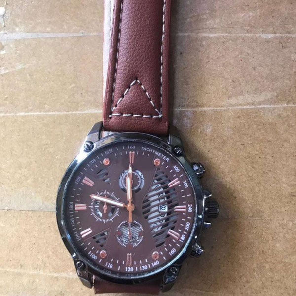 Men's sports pointer quartz watch with round dial, alloy case, brown leather strap, and tachymeter features