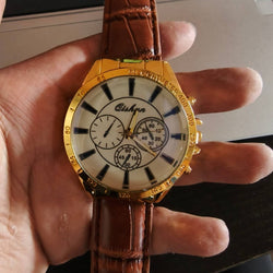 Men's sports watch with gold alloy round dial and brown leather strap